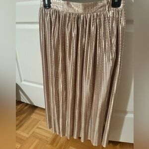 Beautifully gold colour mid lengthy skirt from Sabina Musayev